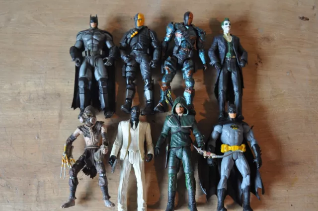 Batman, DC Figure collection including Batman, Arrow, Scarecrow, and the Joker