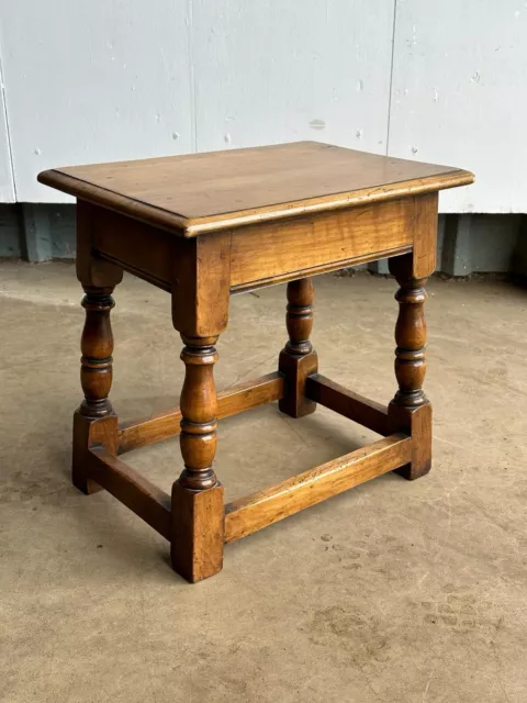 A 20th century stained birch joint stool