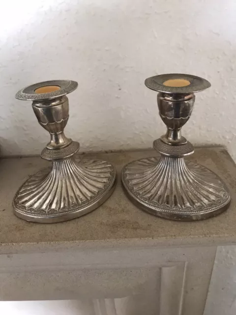 A Pair Of Silver Plated Candlesticks By Falstaff, England