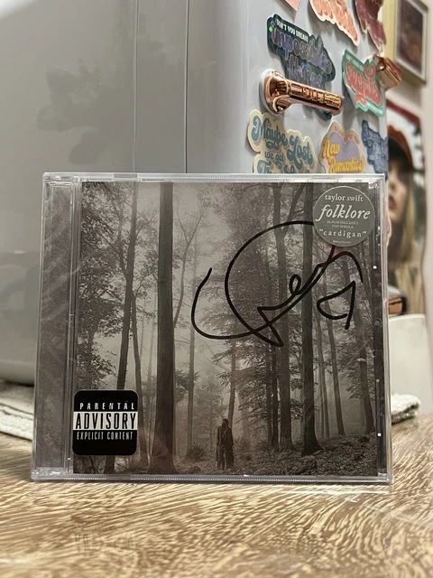 TAYLOR SWIFT FOLKLORE Signed Album with heart sealed $180.00