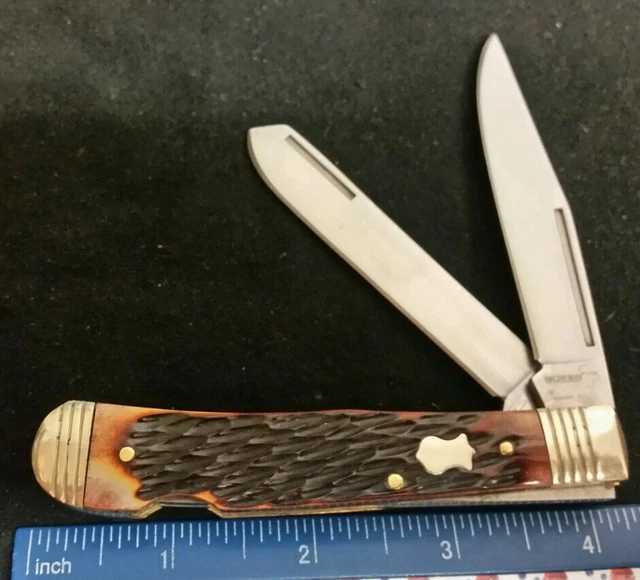 Boker Plus lockback Trapper knife, jigged brown bone handles  =