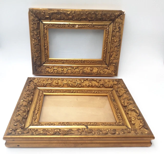 Paire de cadres anciens rectangulaires en bois doré