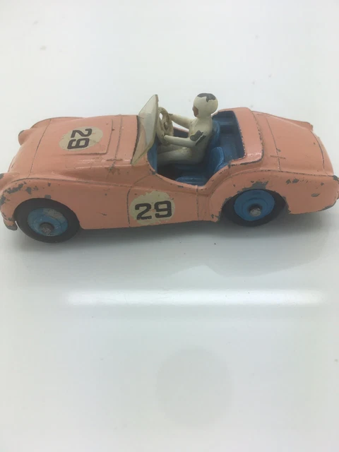 Dinky TR2 no111 cerise competition blue hubs play worn original RN 28 no box Dinky TR2 no111 cerise competition blue hubs play worn original RN 28 no box