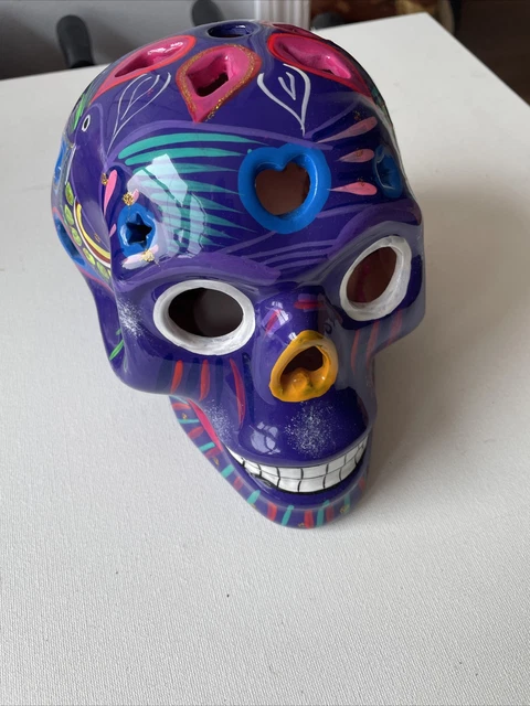 Hand painted day of the dead ceramic skull