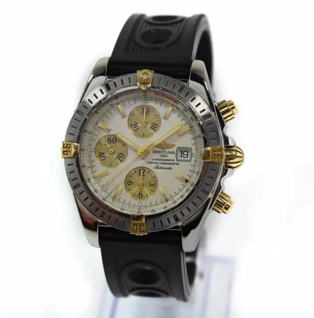 Breitling Chronomat Evolution B13356 44MM Silver Dial 18K Yellow Gold Steel