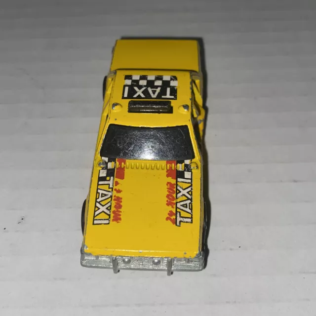 Vintage Hot Wheels 1983 Die Cast Yellow Taxi Crash Door #652