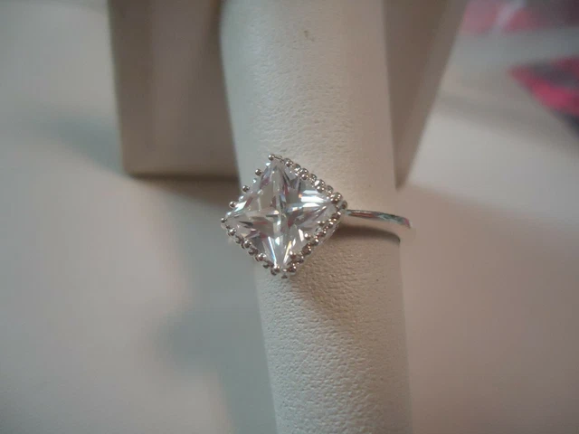 Avon Ring Silvertone Princess Cut Solitaire Set on Diagonal Deep Setting Size 6