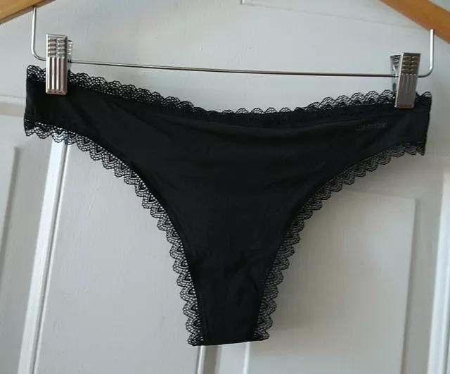 Calvin Klein Women's Black Lace Trim Thong Panty, Size L