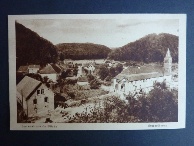 STURZELBRONN Prés de Bitche Moselle CPA 57 l'église et vue du village