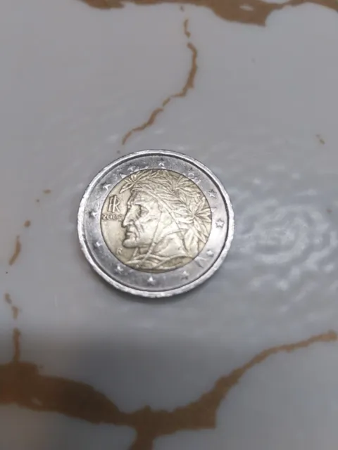 moneda española 2 euro,rostro del poeta Dante Alighieri