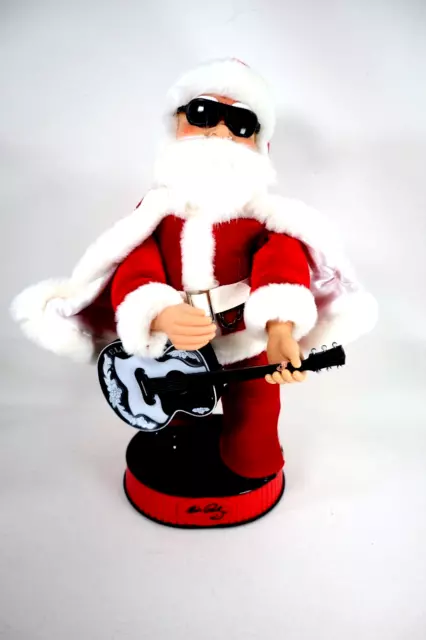 Santas Best Elvis Presley Animated Santa Guitar Sings "Here Comes Santa Clause"