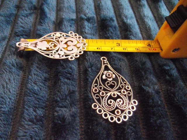 Accesorios para pendientes de araña tono plateado - 1 par