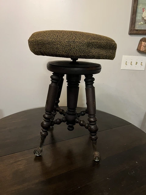 Gorgeous Antique Piano Stool with brass legs, glass feet and seat cover/ pad.