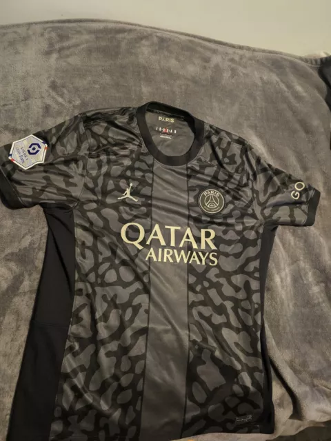 Official PSG 23/24 Jordan Third Shirt Mbappe 7 with Ligue 1 Badge. Large