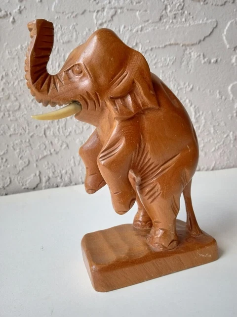 Hand Carved Wood Elephant Standing on Hind Legs with Trunk and Face Up.