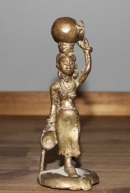 Vintage hand made bronze figurine African woman carry pot on her head