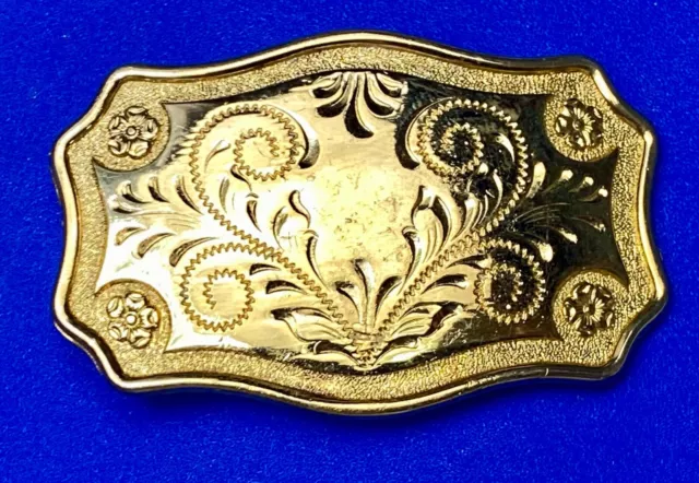 Western ornate flower swirl gold tone belt buckle