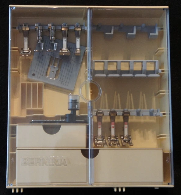 Bernina Accessories Case w/9 feet and a stitch plate in Very Good Condition ! Bernina Accessories Case w/9 feet and a stitch plate in Very Good Condition !