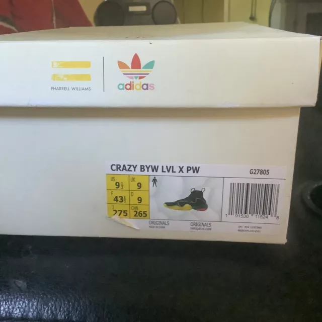 Human race adidas top amarillas