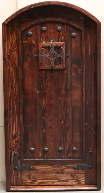 Rustic reclaimed lumber arched door solid wood storybook castle winery speakeasy