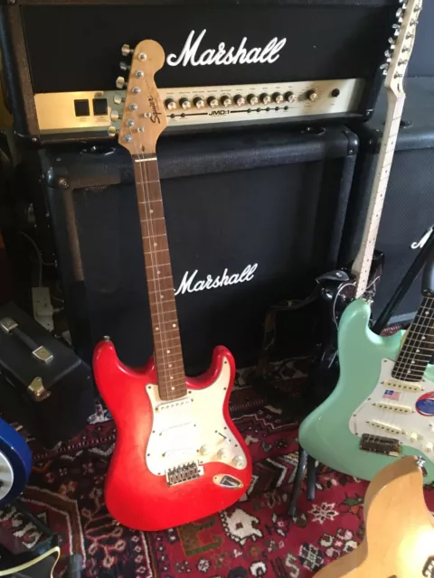 Squier by Fender Stratocaster in Red. Circa 2000. Resto. Offers?