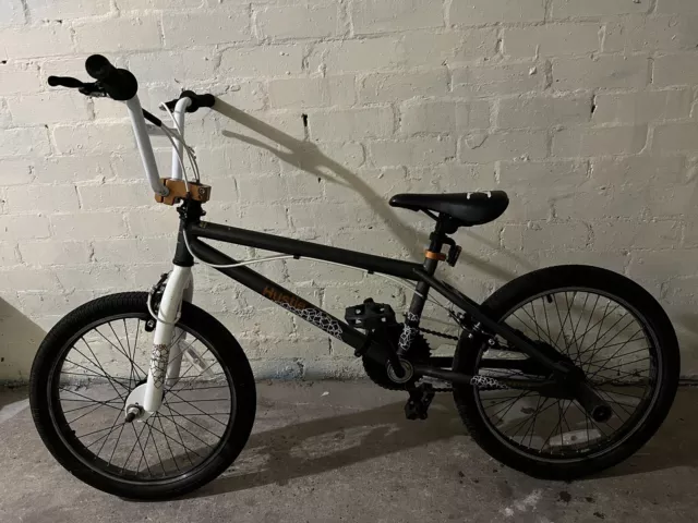 X RATED HUSTLE Bmx bike brand. x rated colour grey white good