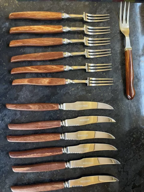 https://www.picclickimg.com/4nsAAOSwq1Jlebpc/Vintage-Glosswood-Stainless-Steel-Cutlery-Set-13pc.webp