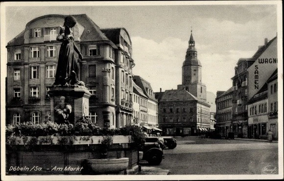 Ak Döbeln in Sachsen, Straßenpartie, Brunnen, Marktplatz, Kirche - 4003188
