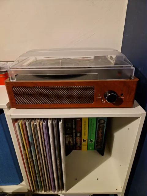 Vinyl record player with speakers