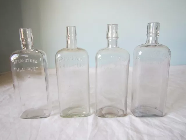 lot of 4 antique whiskey bottles rectangular  Guaranteed  Full Pint