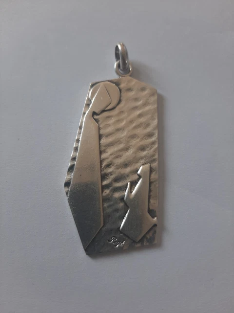 Pendentif argent, femme casqué décor Art Nouveau, signé Becker, 1900