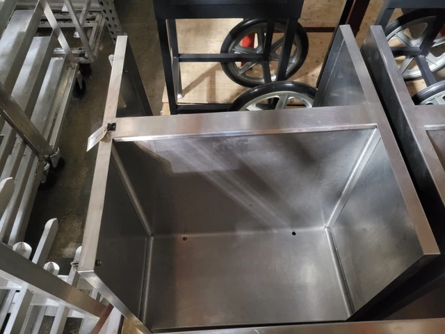 All stainless steel dolly for dishes 2 x  22"x10" sections. 25"H