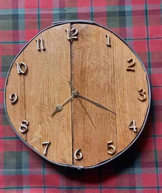 Wall clock, made from part of a refurbished whisky cask lid.  