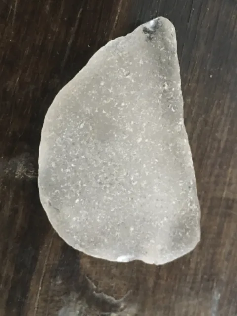 clear Brittany Sea surf tumbled sea glass piece prob from bottom of bottle