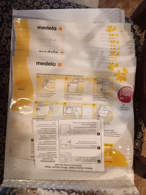 Medela Quick Clean Micro-Steam Bags 12 Count Sterilizing Bags.opened box.