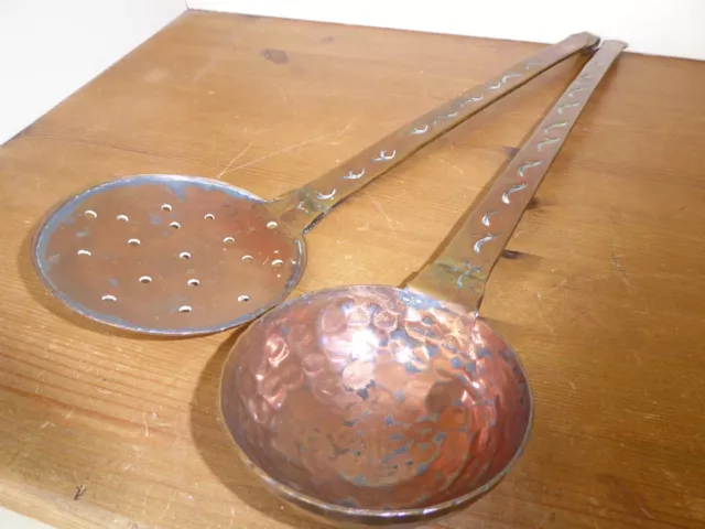 Antique copper kitchen utensils, beaten embossed handles, spoon ladle skimmer