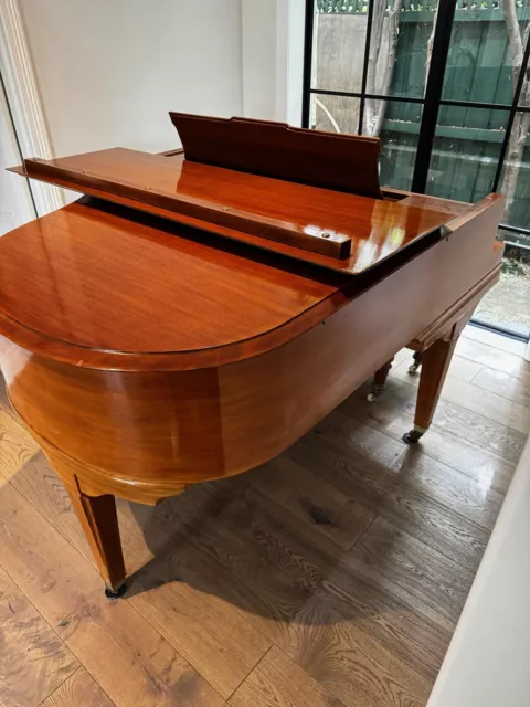 Antique Super Grand Piano