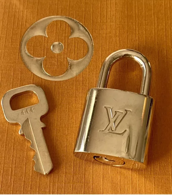 Louis Vuitton Lock and key set 318  Vuitton, Louis vuitton accessories,  Louis vuitton