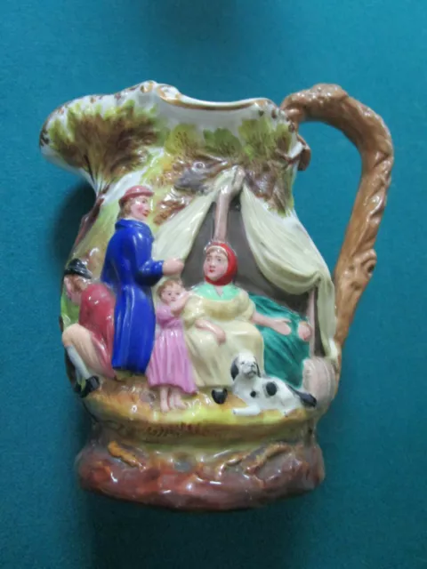ANTIQUE STAFFORDSHIRE PEARL WARE JUG, mid-19th century, moulded with PEOPLE