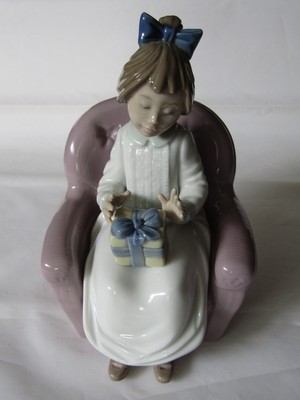 Nao Lladro Daisa 1991 Girl with Gift Sitting on Chair, Retired Figurine.