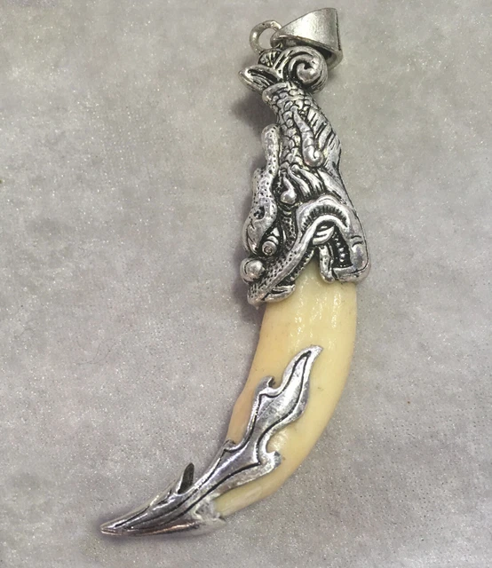 Wolf's teeth pendant set with Tibetan silver charms pendant N