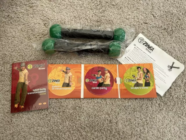 Zumba Fitness Toning Sticks 3 Dvds & Guide Book.