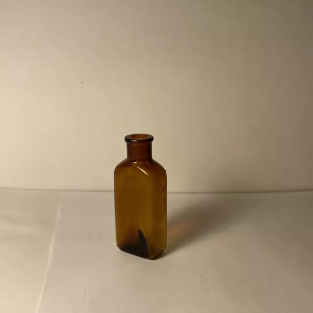 Antique Amber Glass Poison Bottle
