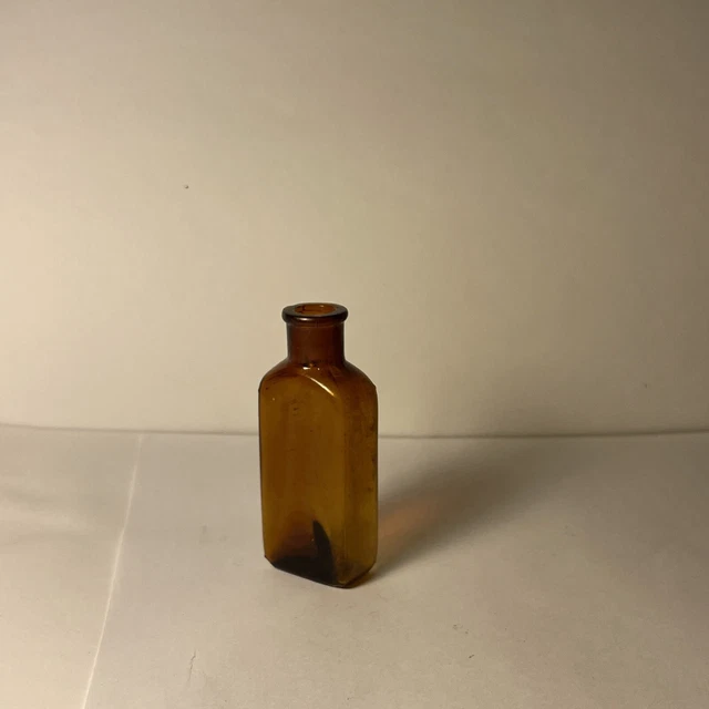 Antique Amber Glass Poison Bottle