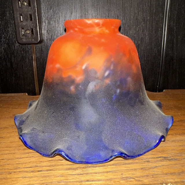 2 1/4 inch glass  vary beautiful  hand made two layer glass ￼ very unique Glass