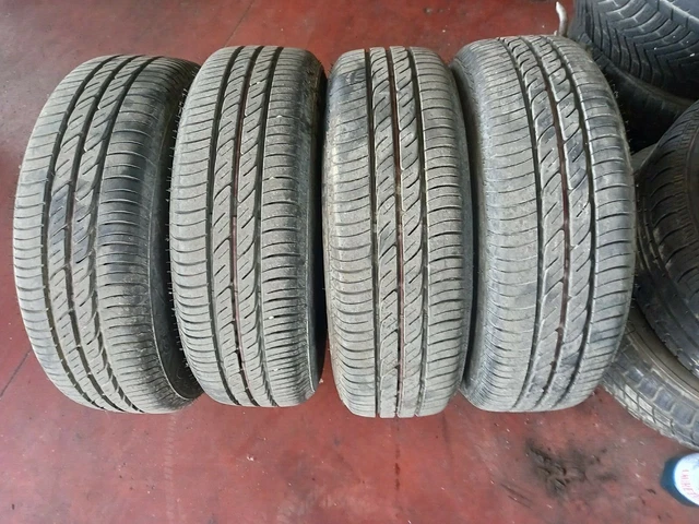 N.4 Cerchi In Ferro Ford 4 Fori - 14 + Gomme Come Nuove + Copricerchi + Dadi