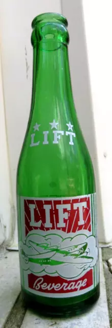 LIFT BEVERAGE 7 oz. Green ACL Soda Bottle Three Star Bottling Verona PA Airplane