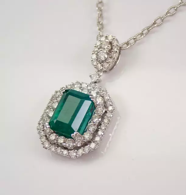 4 Ct Emerald Cut Lab-Created Green Emerald Halo Pendant In 14K White Gold Plated