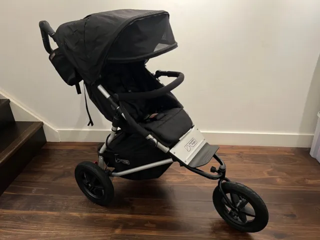 Mountain Buggy Terrain pushchair in black with baby bag and accessories