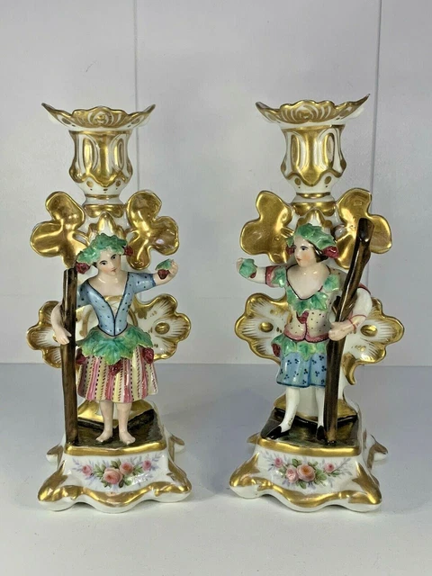 PAIRE DE BOUGEOIRS ANCIENS EN PORCELAINE DE PARIS XIXème